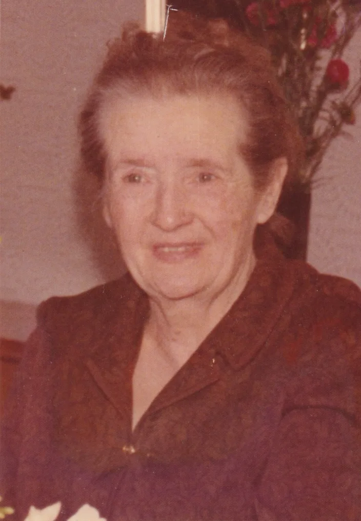 Faded portrait fully restored with AI