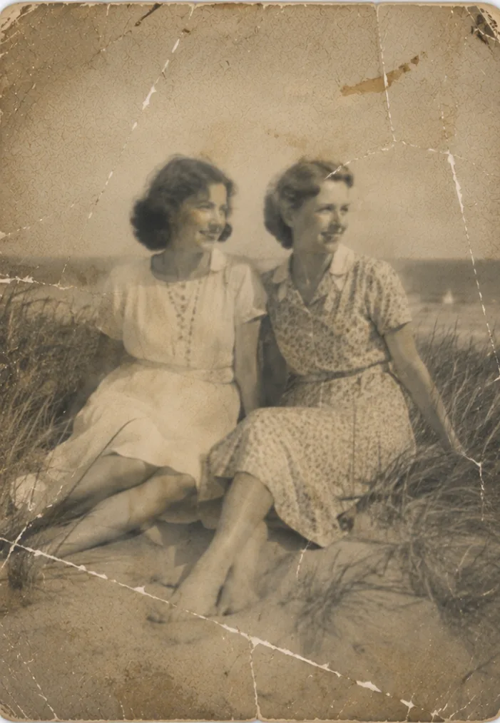 Damaged old photo fully restored with AI