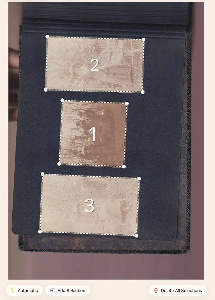 PhotoScanner automatically detecting three printed photos on an album page in a single scan